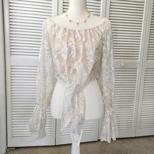 Cache Bolero top. Beige bodice with lace overlay and sheer lace sleeves. Size S.